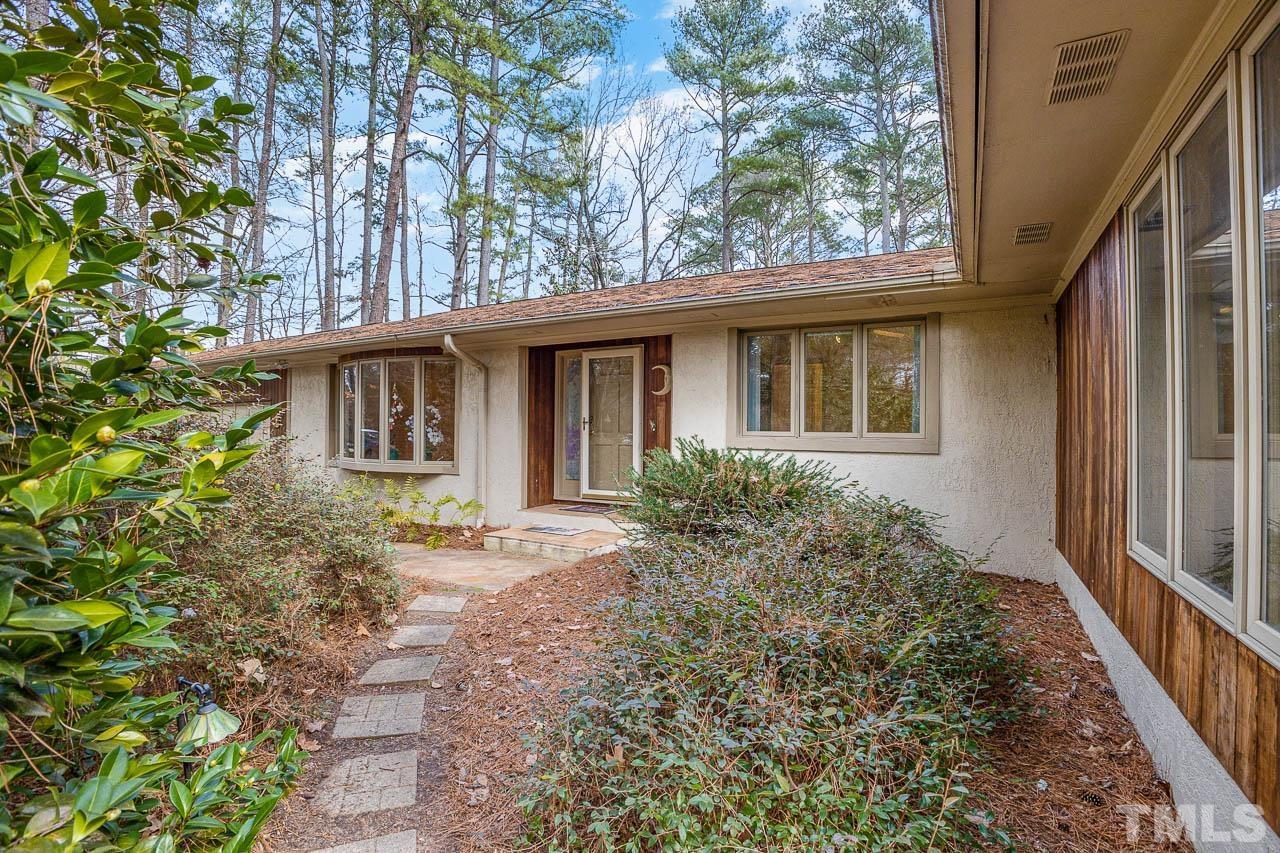 9006 Honeycutt Road Raleigh, NC 27615 - Photo 31 of 54 a view of a house with a yard
