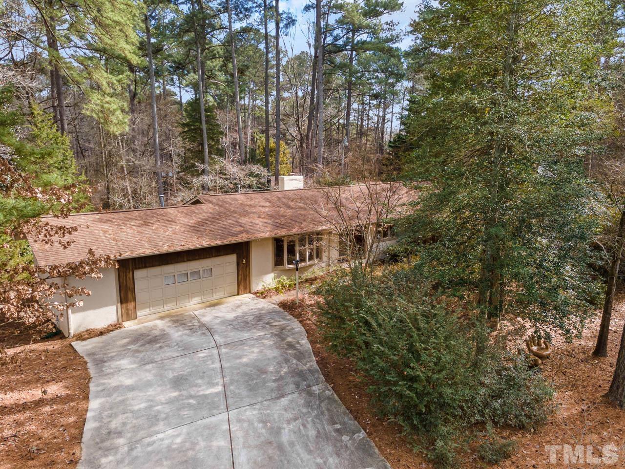 9006 Honeycutt Road Raleigh, NC 27615 - Photo 32 of 54 an aerial view of a house with a yard