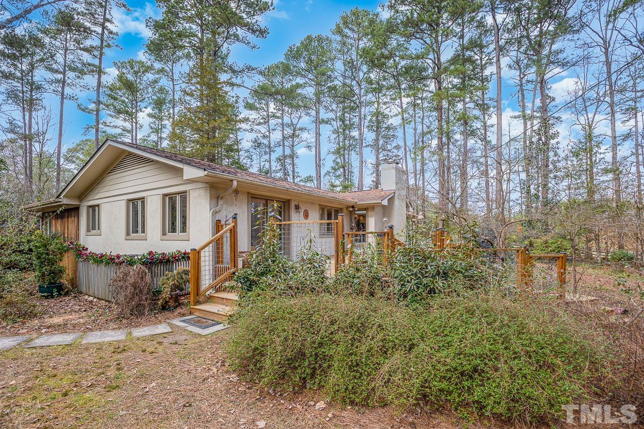 9006 Honeycutt Road Raleigh, NC 27615 - Photo 36 of 54 a view of a yard in front of house
