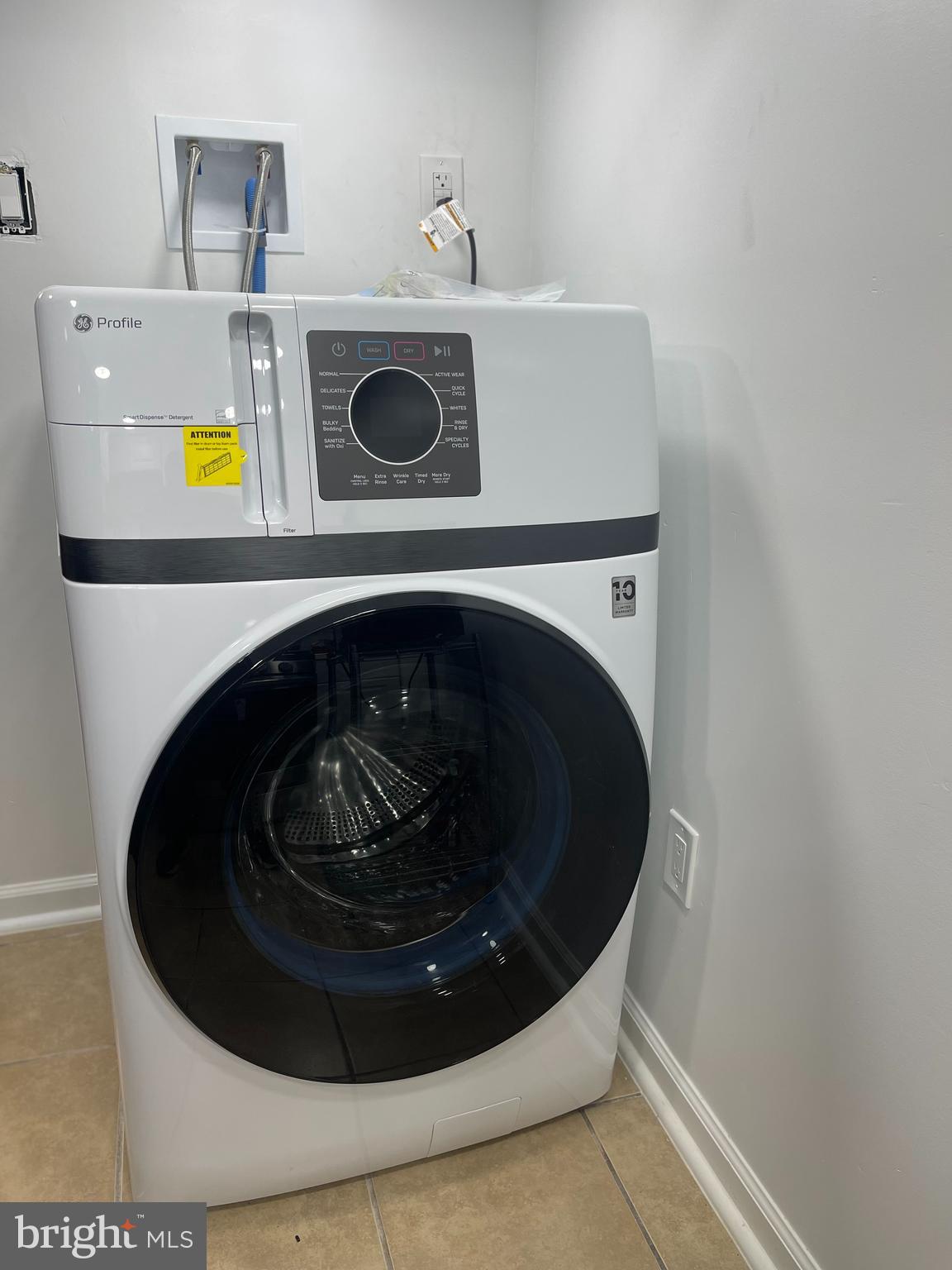 6906 Parkwood Street, Unit C Hyattsville, MD 20784 - Photo 4 of 9 a close up view of a washer and dryer