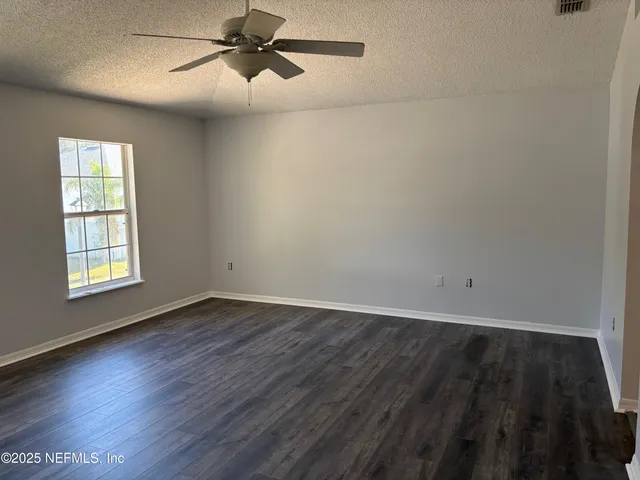 a white bath tub sitting in a bathroom