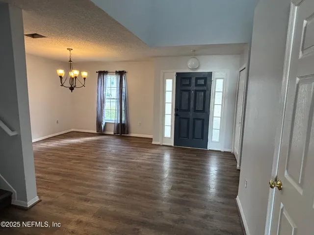a kitchen with a sink and a window