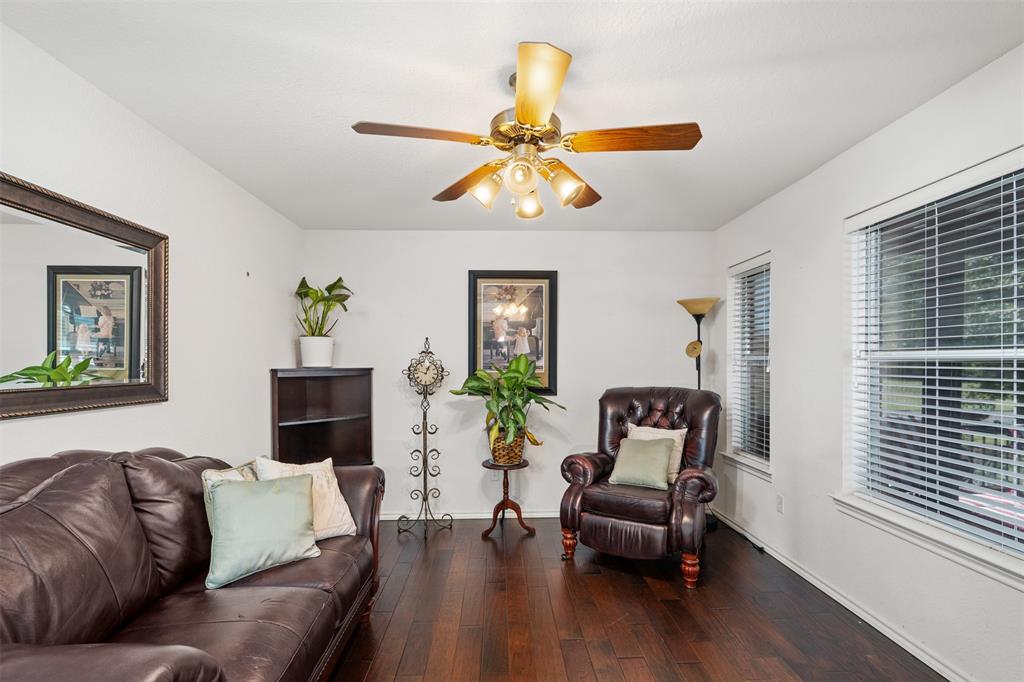 11306 Jennifer Circle Sanger, TX 76266 - Photo 15 of 24 a living room with furniture and a couch