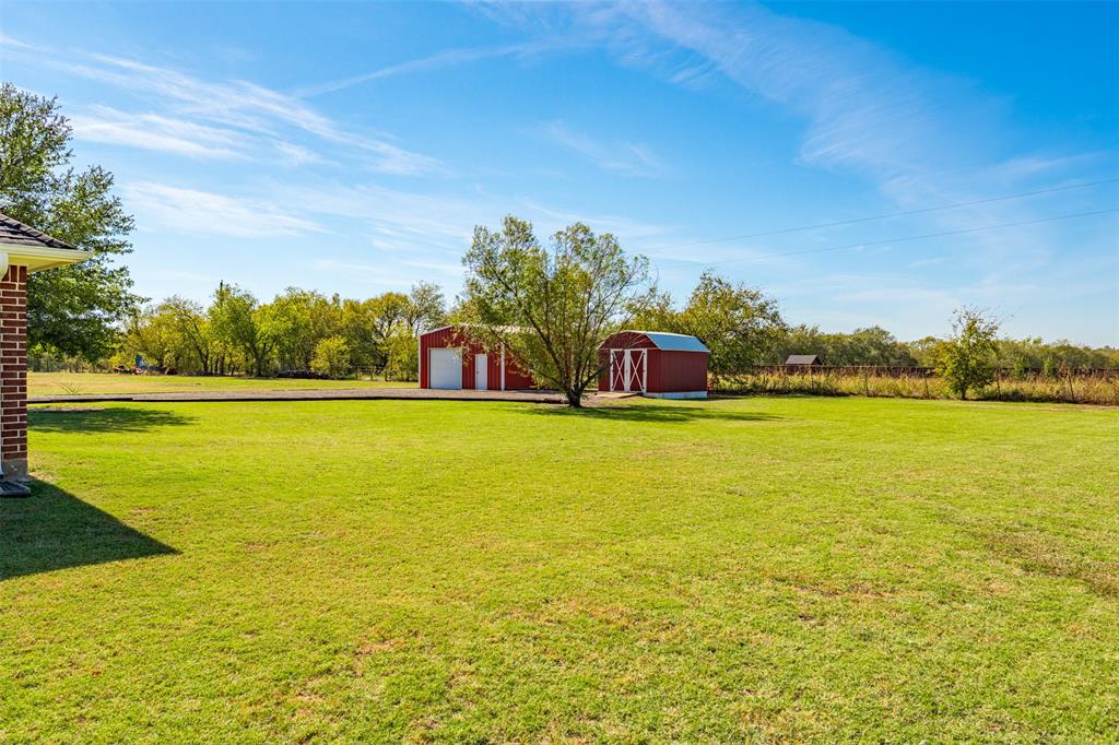 11306 Jennifer Circle Sanger, TX 76266 - Photo 2 of 24 a view of an ocean and beach