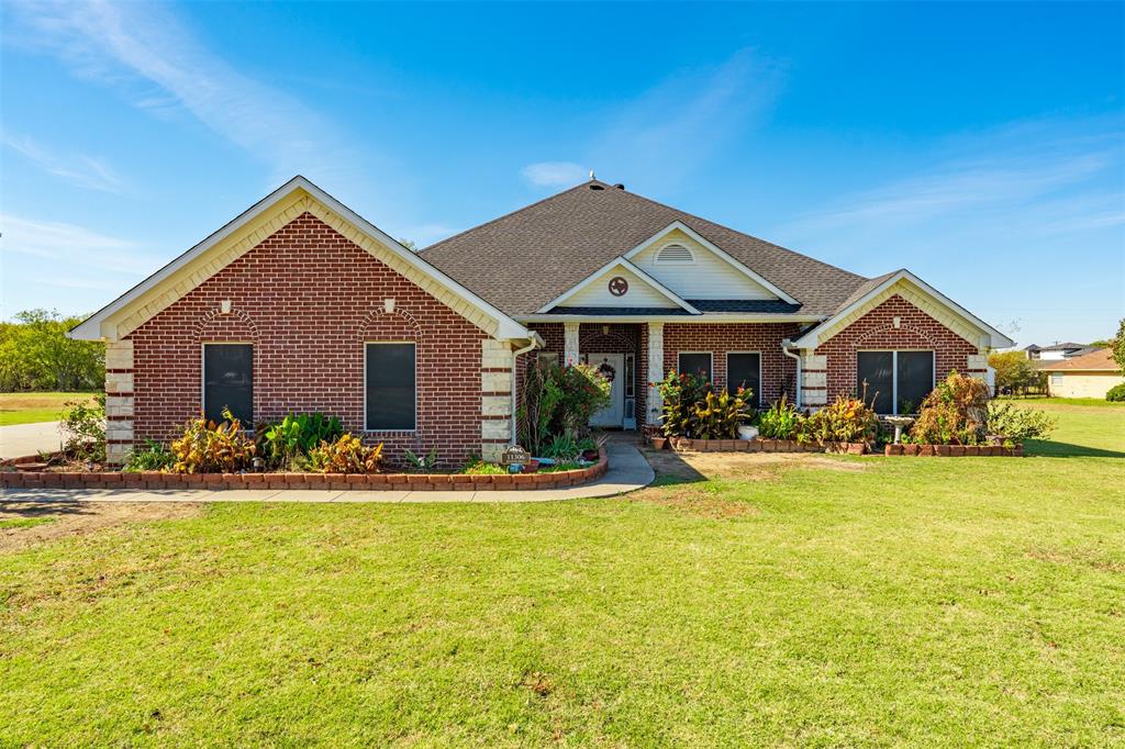11306 Jennifer Circle Sanger, TX 76266 - Photo 21 of 24 a front view of a house with swimming pool