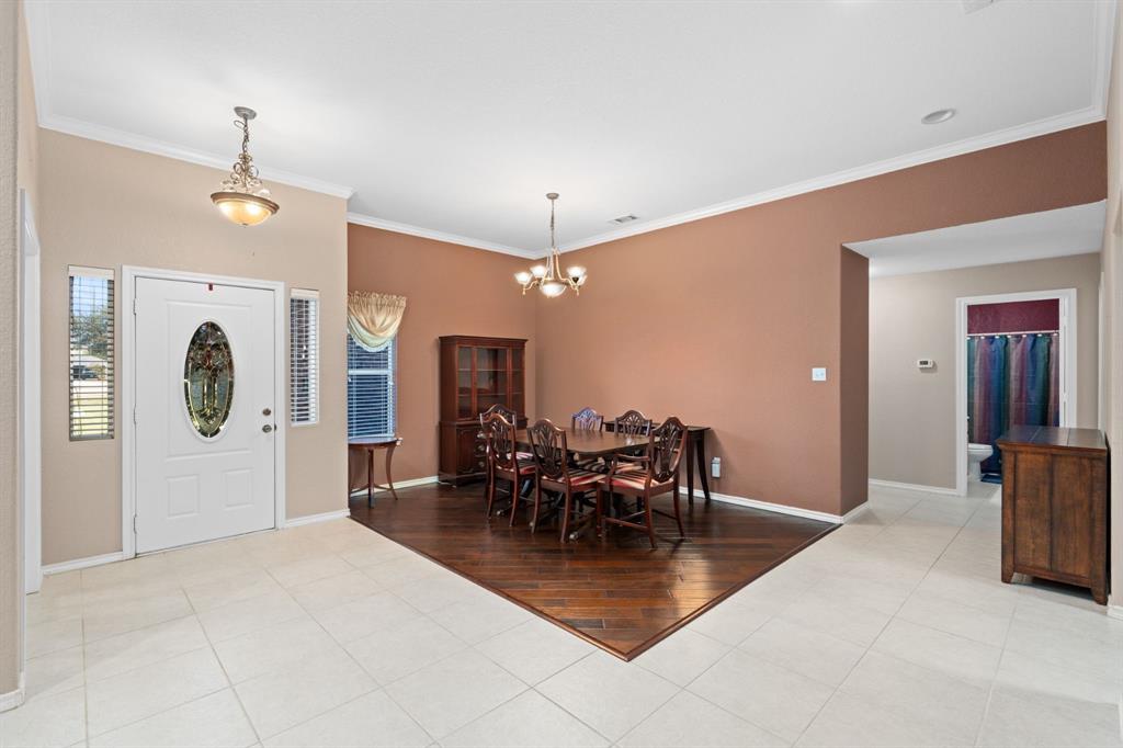 11306 Jennifer Circle Sanger, TX 76266 - Photo 5 of 24 a view of a dining room with furniture