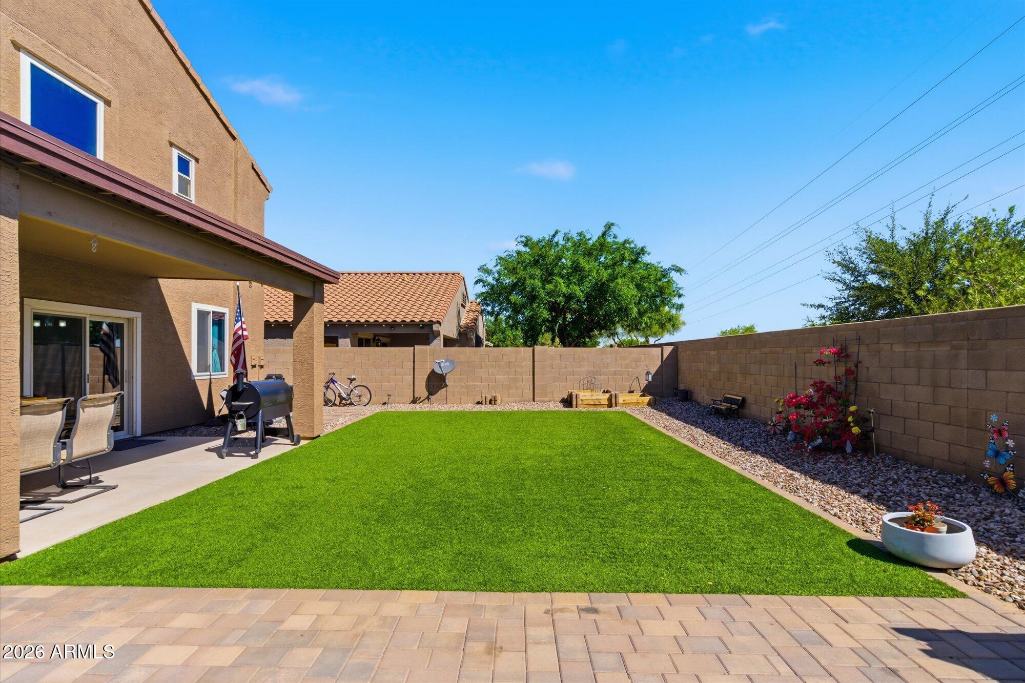 21915 Dietz Drive Maricopa, AZ 85138 - Photo 28 of 31 a backyard of a house with seating space