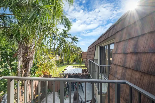 a view of a balcony with an outdoor space