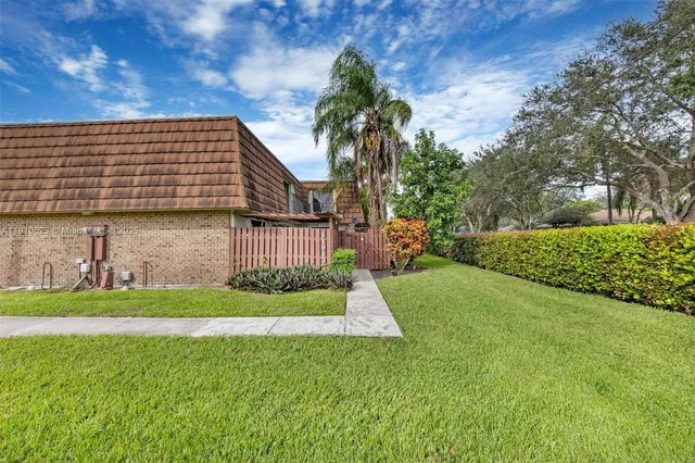 a view of a back yard of the house