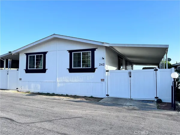 a front view of a house with a garage