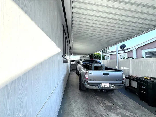a view of a balcony with chairs