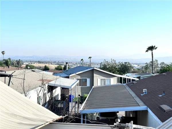 a view of yard with patio