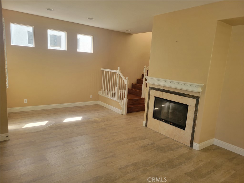 28 First Street Ladera Ranch, CA 92694 - Photo 4 of 18 a view of empty room with a fireplace