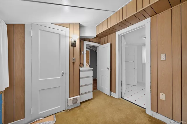 a bathroom with a sink mirror toilet and bathtub