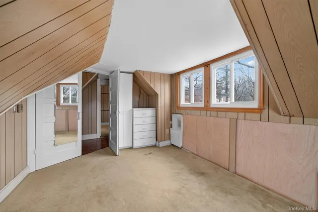 a view of house with outdoor seating