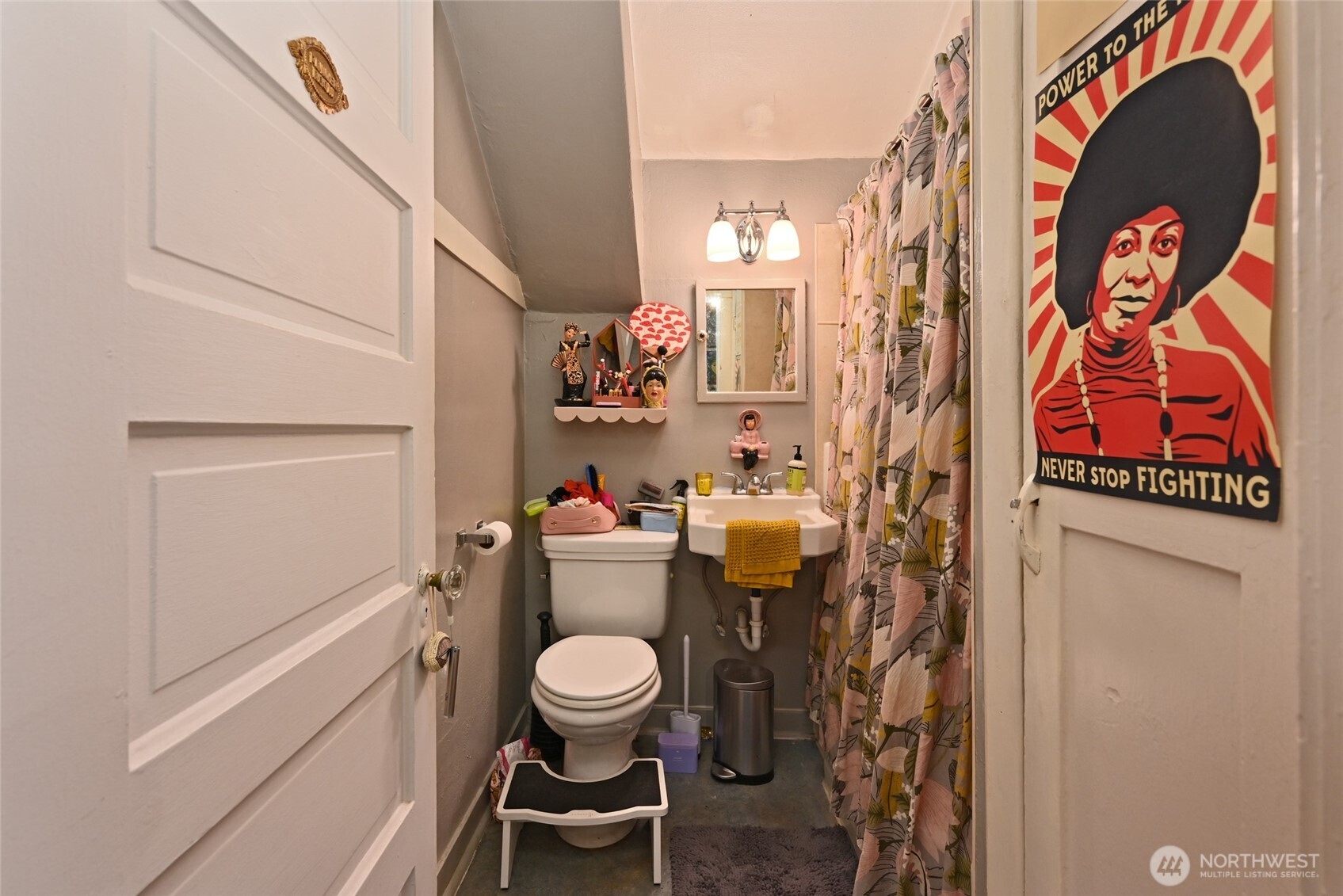 1425 East Prospect Street, Unit 110 Seattle, WA 98112 - Photo 24 of 40 a bathroom with a toilet and a sink