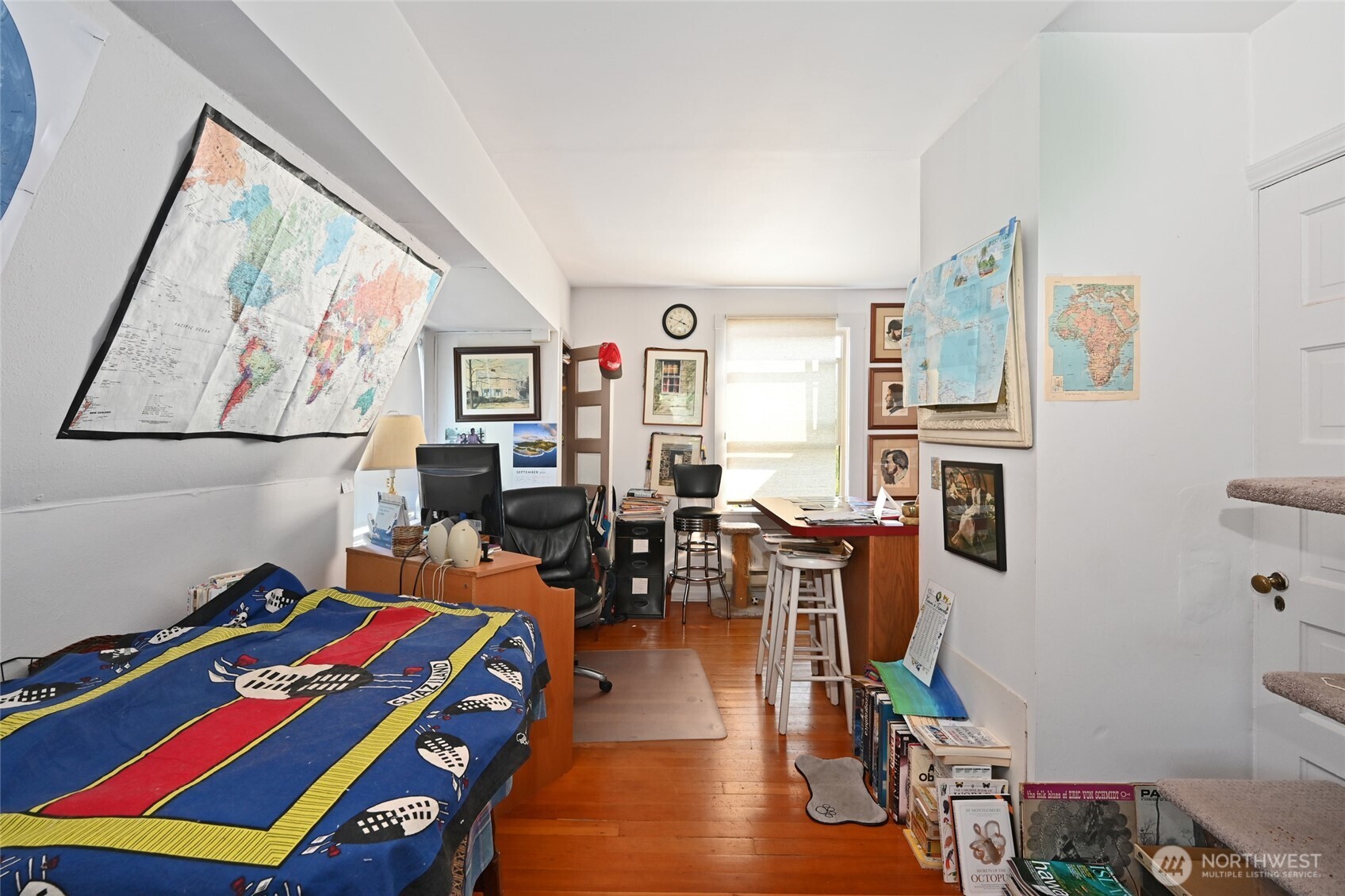 1425 East Prospect Street, Unit 110 Seattle, WA 98112 - Photo 36 of 40 a room with furniture and a rug