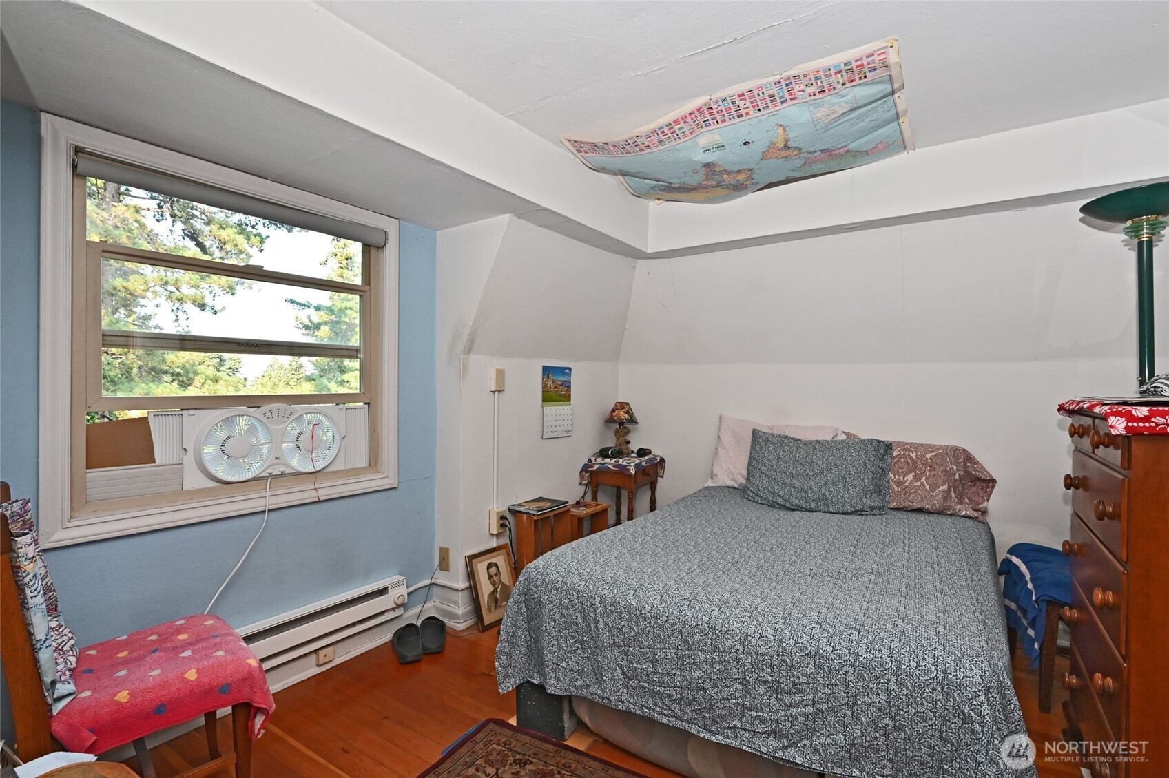 1425 East Prospect Street, Unit 110 Seattle, WA 98112 - Photo 39 of 40 a bedroom with a bed and window