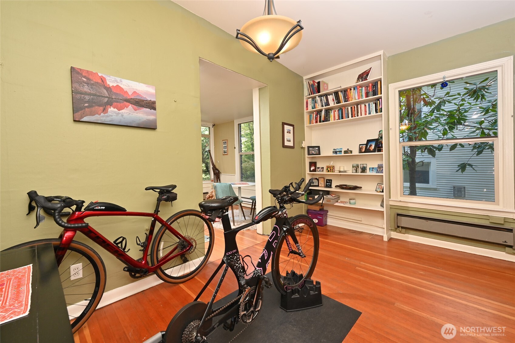 1425 East Prospect Street, Unit 110 Seattle, WA 98112 - Photo 9 of 40 a view of a livingroom with furniture and hardwood floor