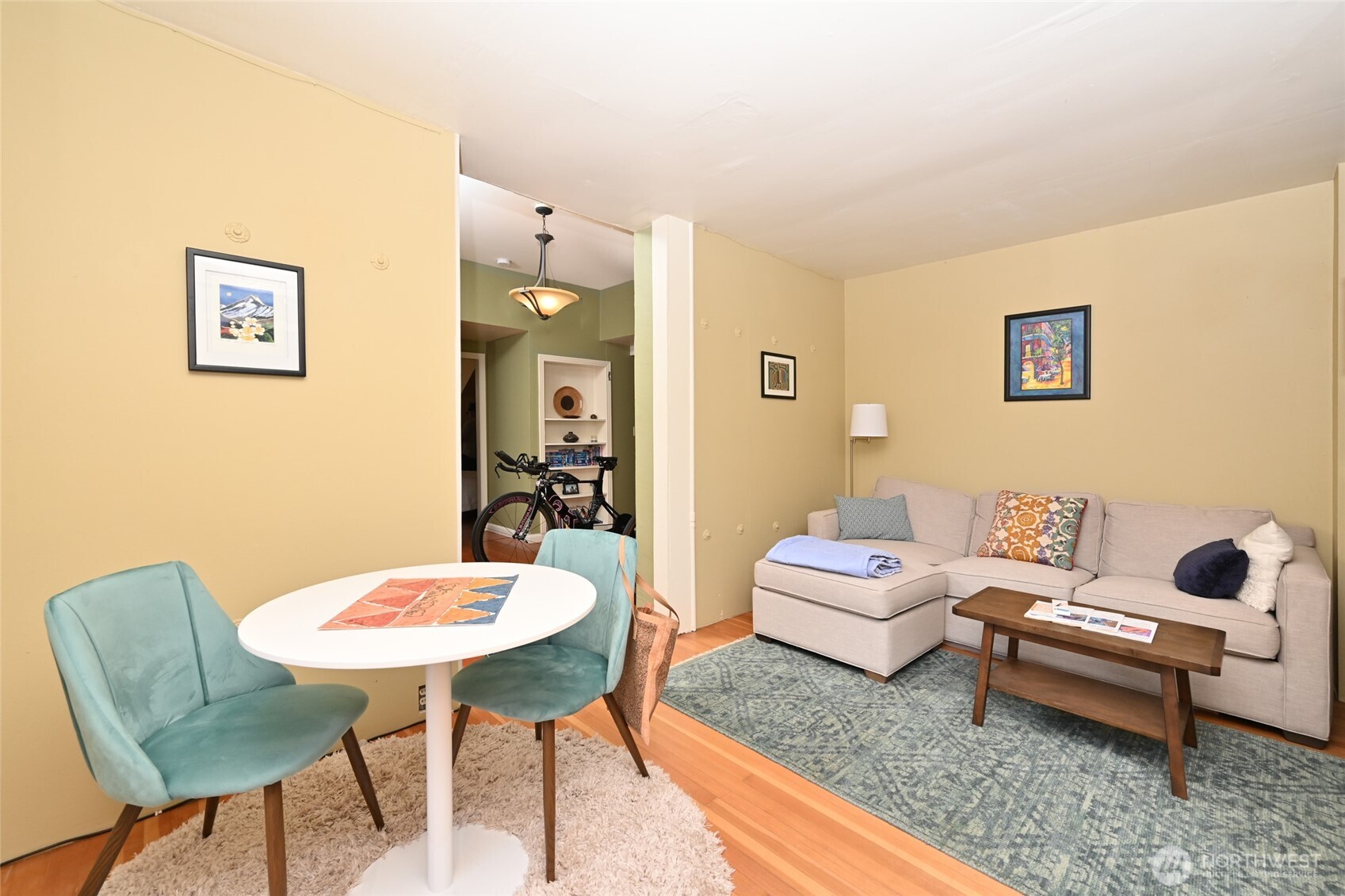 1425 East Prospect Street, Unit 110 Seattle, WA 98112 - Photo 10 of 40 a living room with furniture and a table