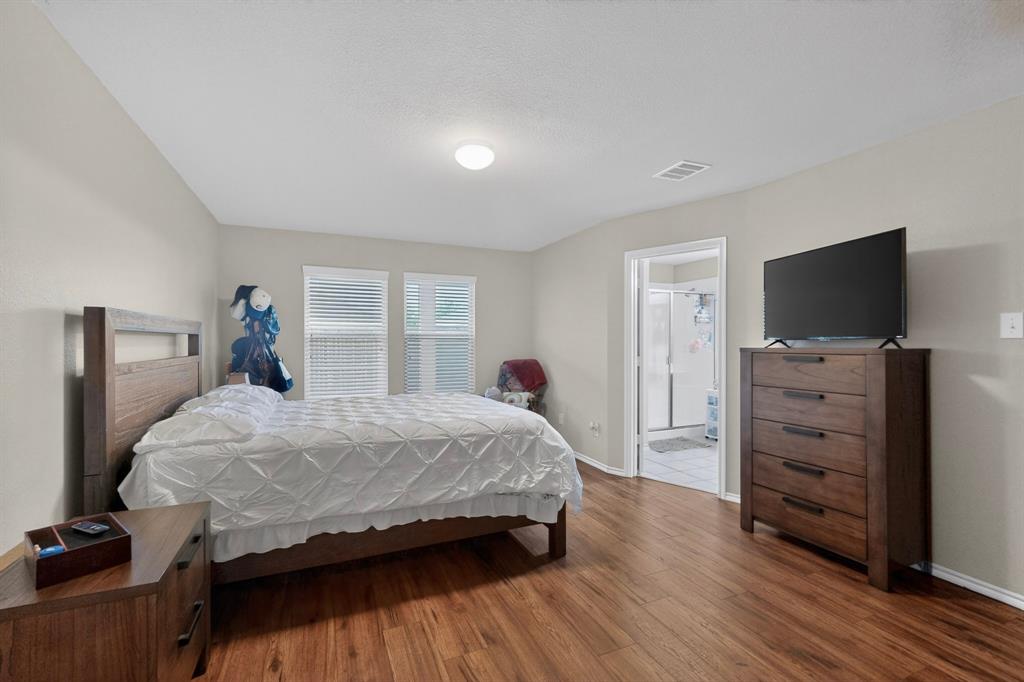 1409 Slate Street Princeton, TX 75407 - Photo 19 of 36 Spacious room with wood-finish flooring, light-toned walls, and recessed lighting