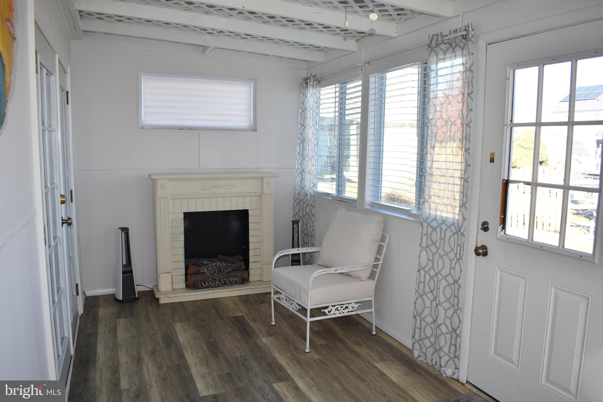 1029 Radio Road Little Egg Harbor, NJ 08087 - Photo 11 of 25 a living room with furniture and a fireplace