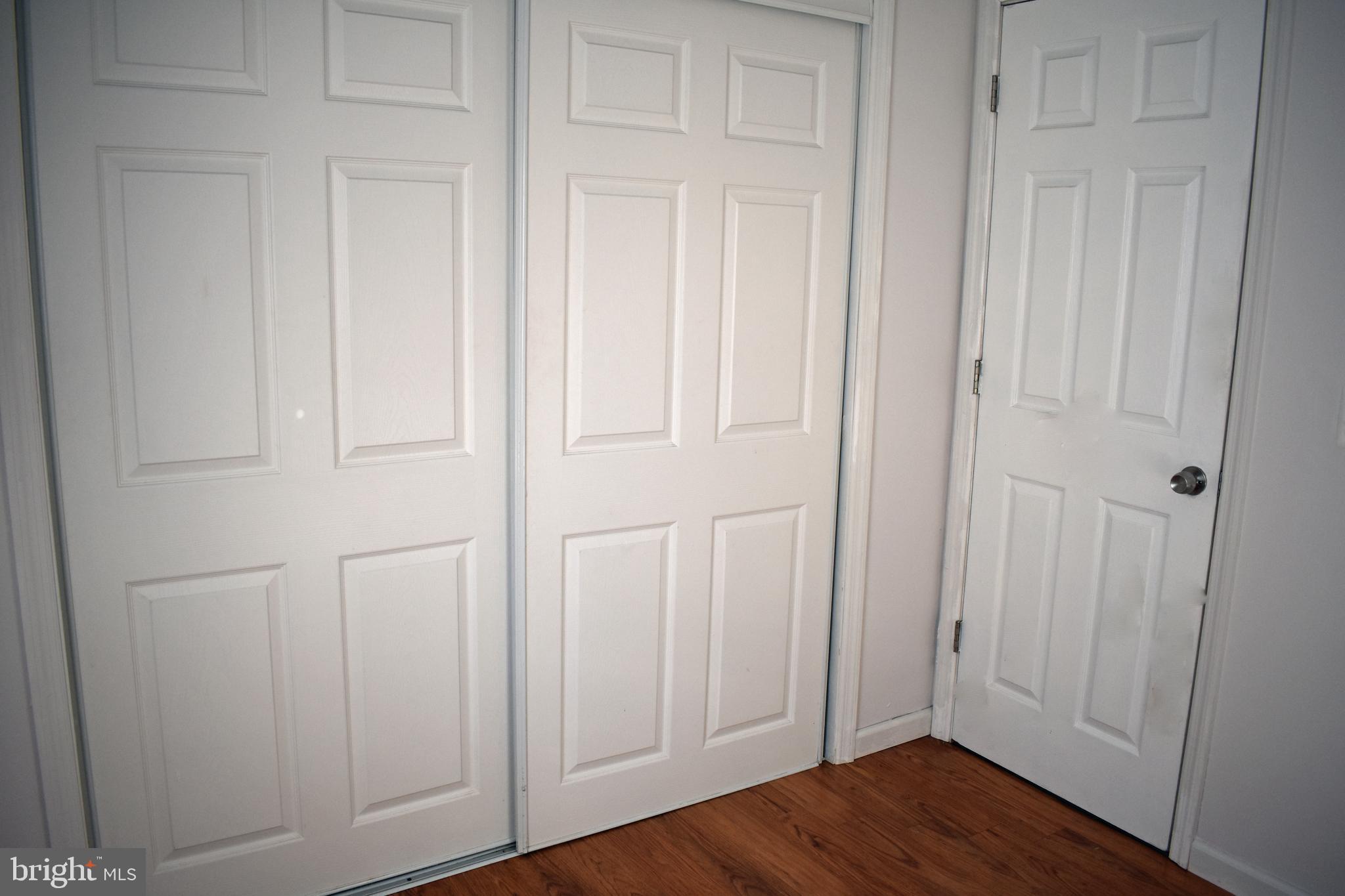 1029 Radio Road Little Egg Harbor, NJ 08087 - Photo 10 of 25 an empty room with wooden floor