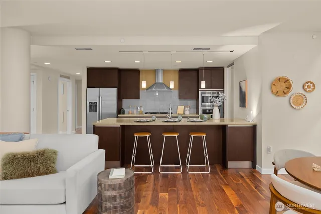 a spacious bathroom with a granite countertop tub sink and a mirror