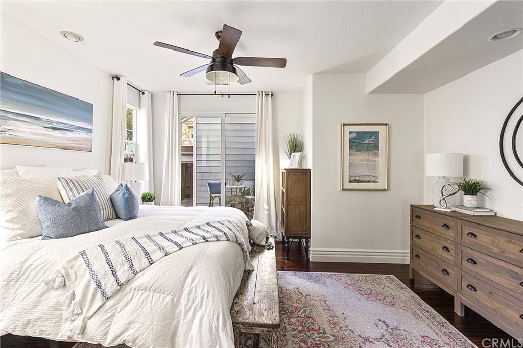 22 Alcott Street Ladera Ranch, CA 92694 - Photo 18 of 46 a bedroom with a bed a dresser and a window