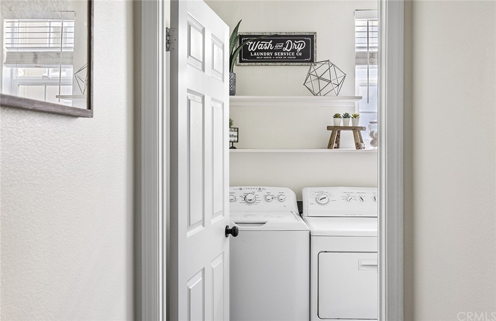 22 Alcott Street Ladera Ranch, CA 92694 - Photo 23 of 46 a utility room with dryer and washer