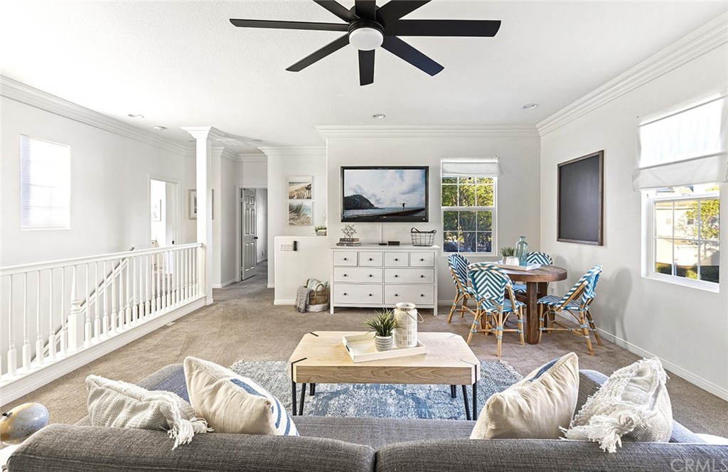 22 Alcott Street Ladera Ranch, CA 92694 - Photo 27 of 46 a living room with furniture and a flat screen tv