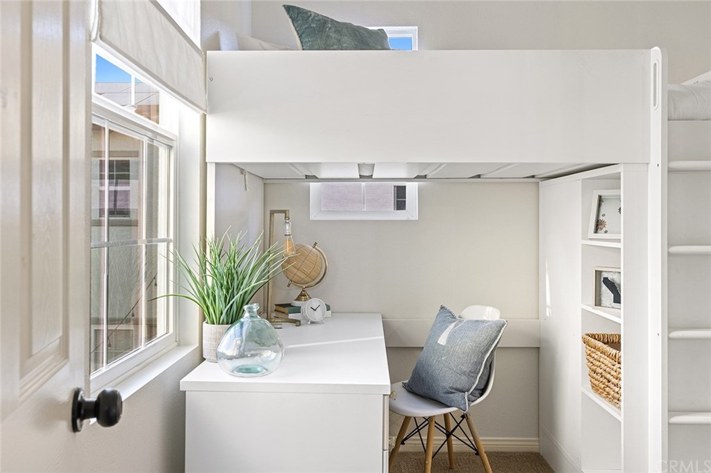 22 Alcott Street Ladera Ranch, CA 92694 - Photo 29 of 46 a view of hallway with furniture and a potted plant