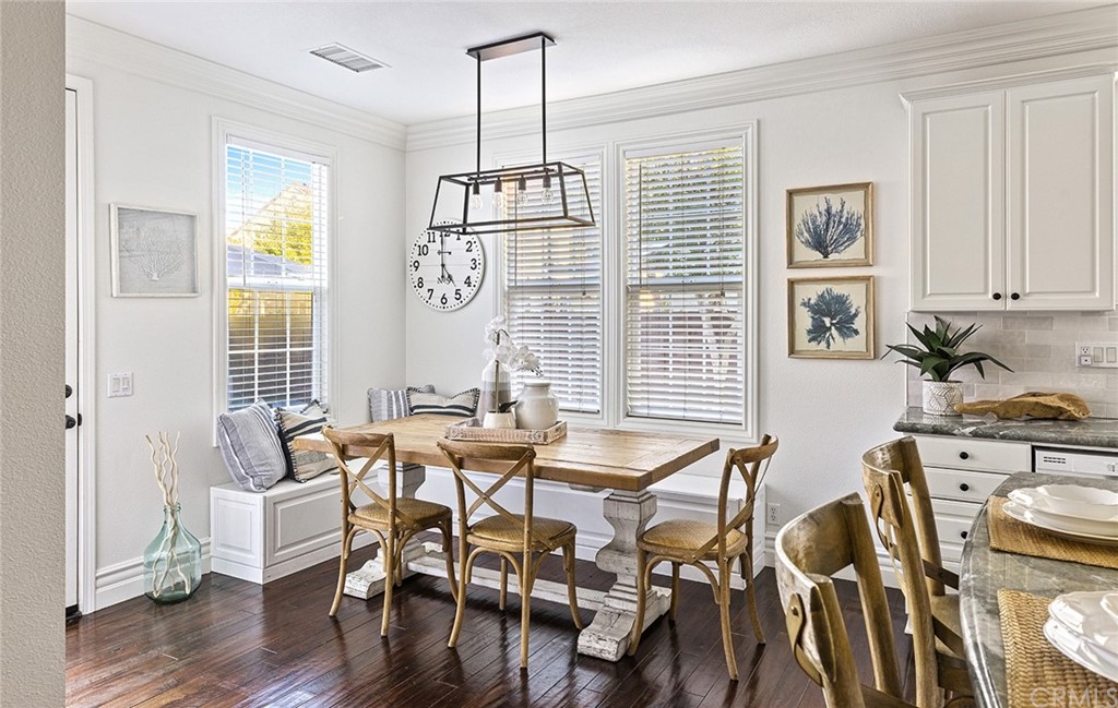22 Alcott Street Ladera Ranch, CA 92694 - Photo 10 of 46 a view of a dining room with furniture window and wooden floor