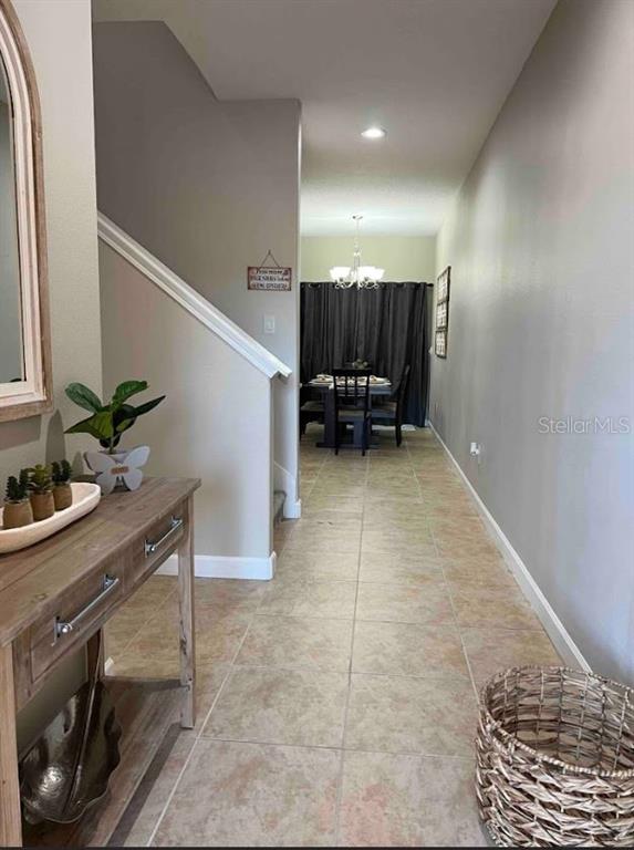 8947 Candy Palm Road Kissimmee, FL 34747 - Photo 14 of 16 a view of kitchen with furniture and a potted plant