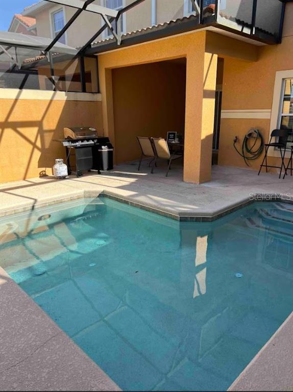 8947 Candy Palm Road Kissimmee, FL 34747 - Photo 2 of 16 a view of swimming pool