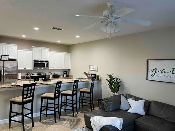 a view of a dining room with furniture