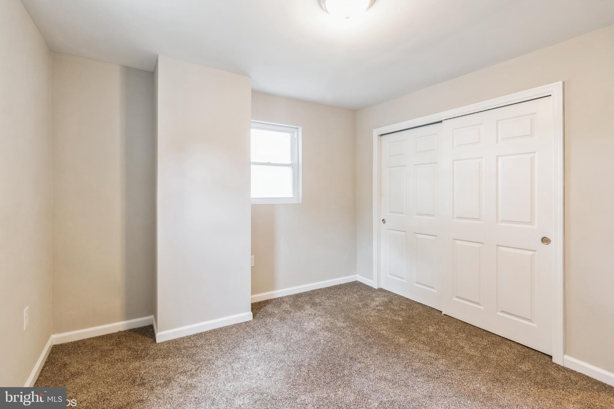 425 Grape Street Warminster, PA 18974 - Photo 15 of 26 an empty room with windows