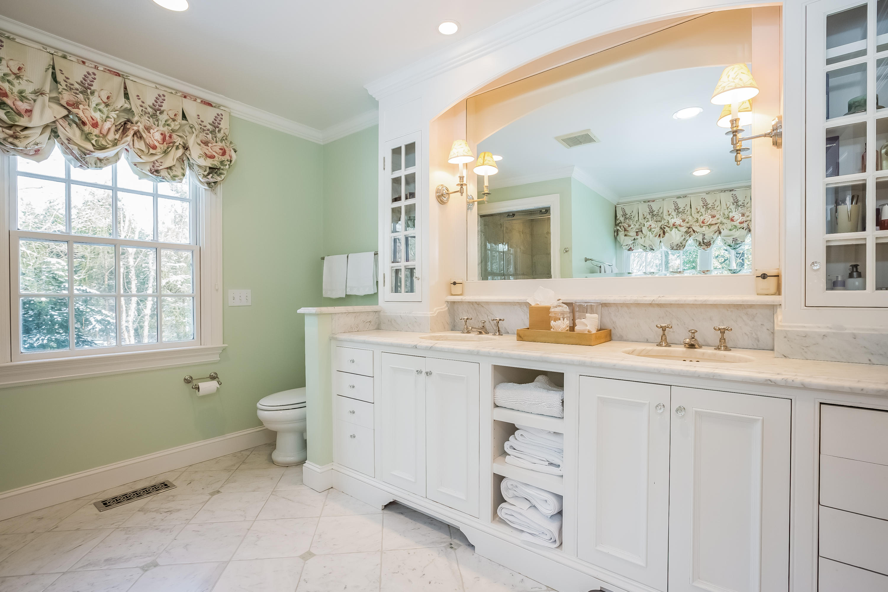 6 Watch Tower Road Darien, CT 06820 - Photo 14 of 30 a spacious bathroom with a granite countertop sink mirror and a toilet
