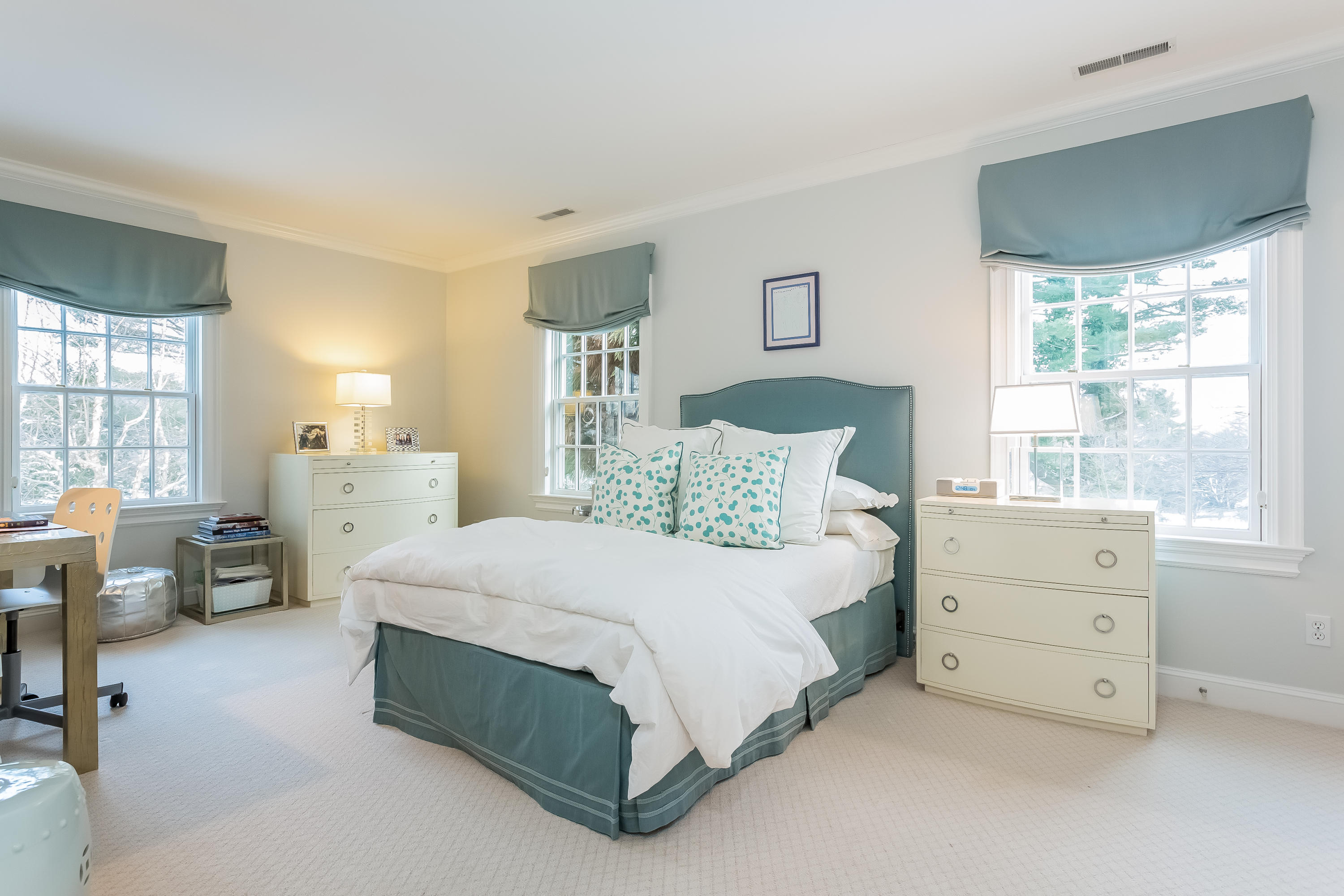 6 Watch Tower Road Darien, CT 06820 - Photo 17 of 30 a bedroom with a bed and a window