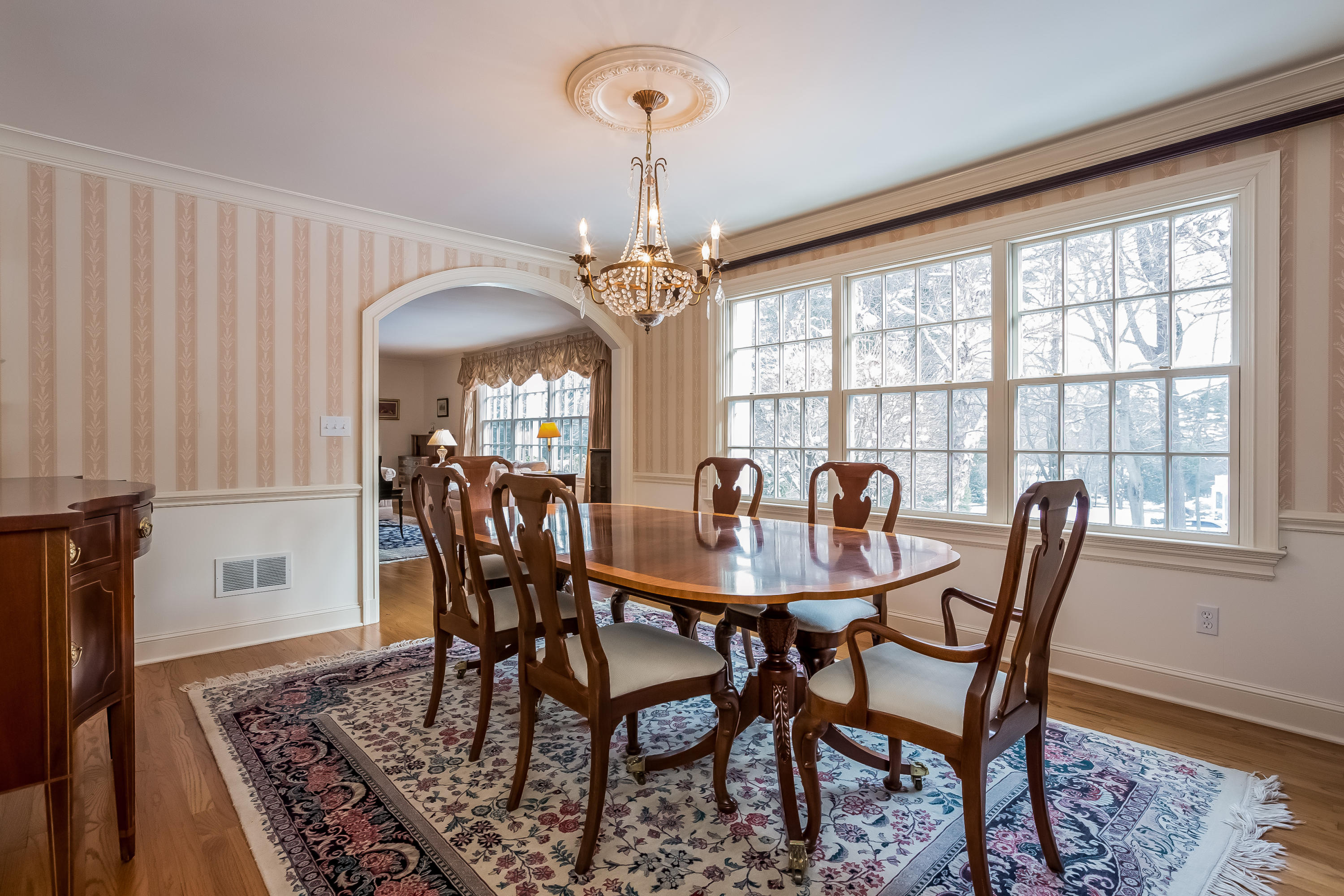 6 Watch Tower Road Darien, CT 06820 - Photo 6 of 30 a view of a dining room with furniture window and wooden floor