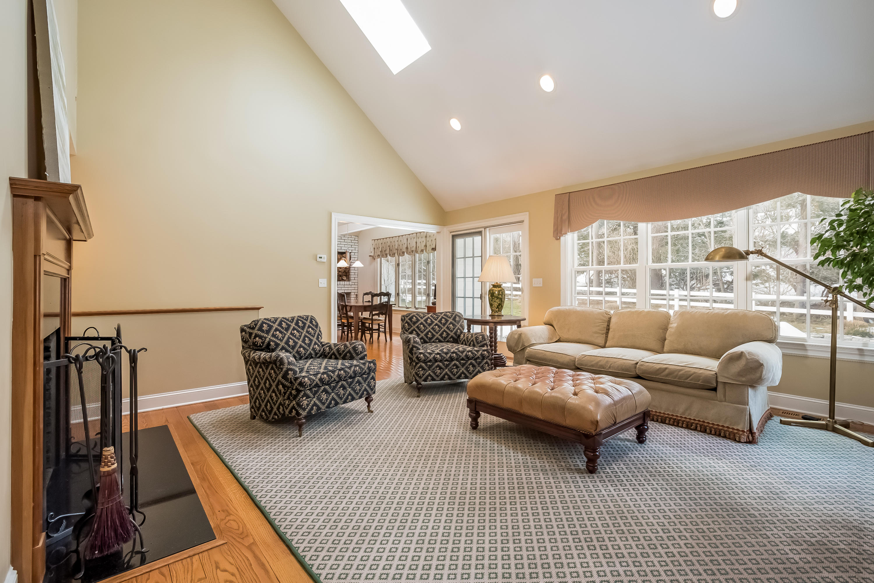 6 Watch Tower Road Darien, CT 06820 - Photo 7 of 30 a living room with furniture and a large window