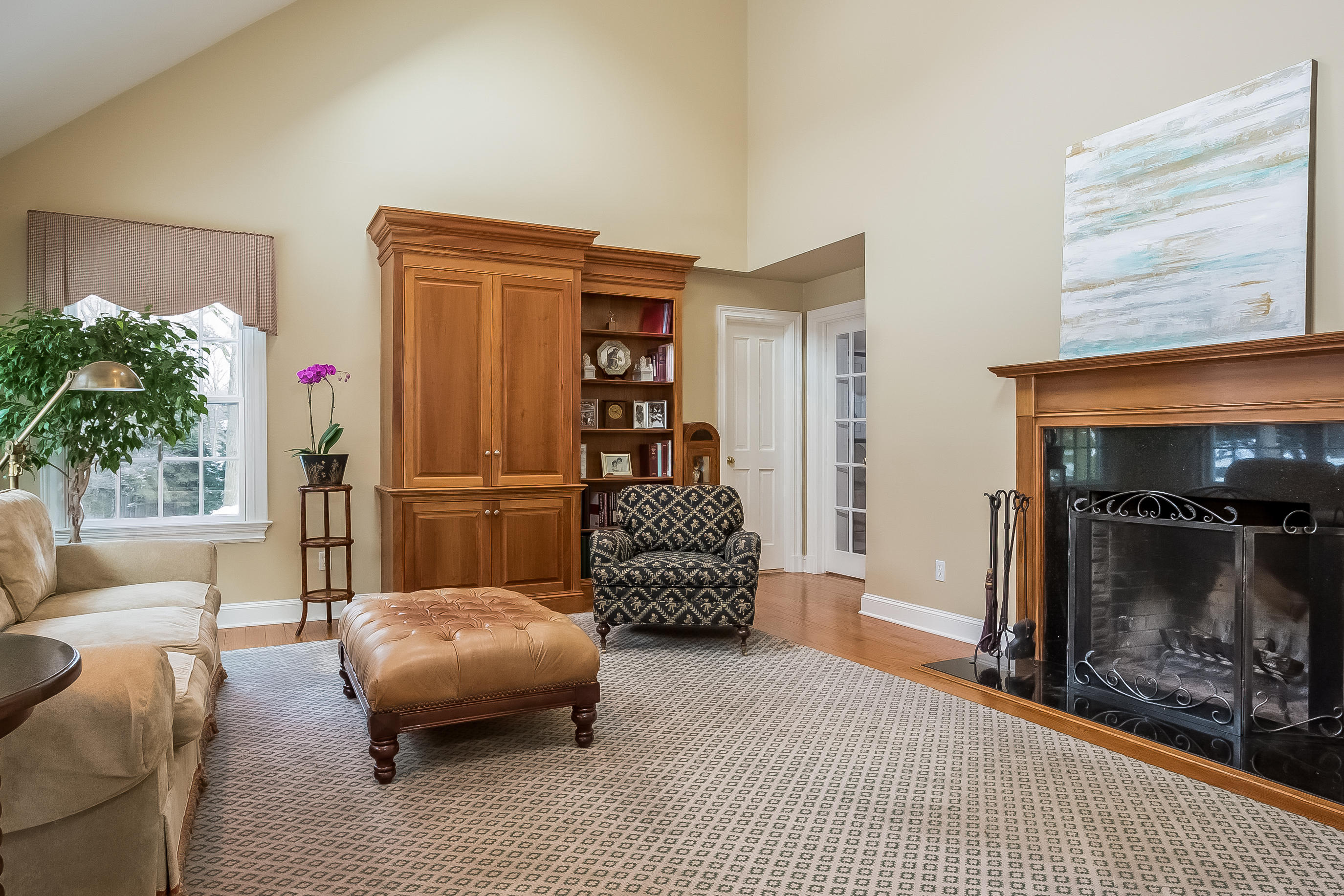 6 Watch Tower Road Darien, CT 06820 - Photo 8 of 30 a living room with furniture and a fireplace