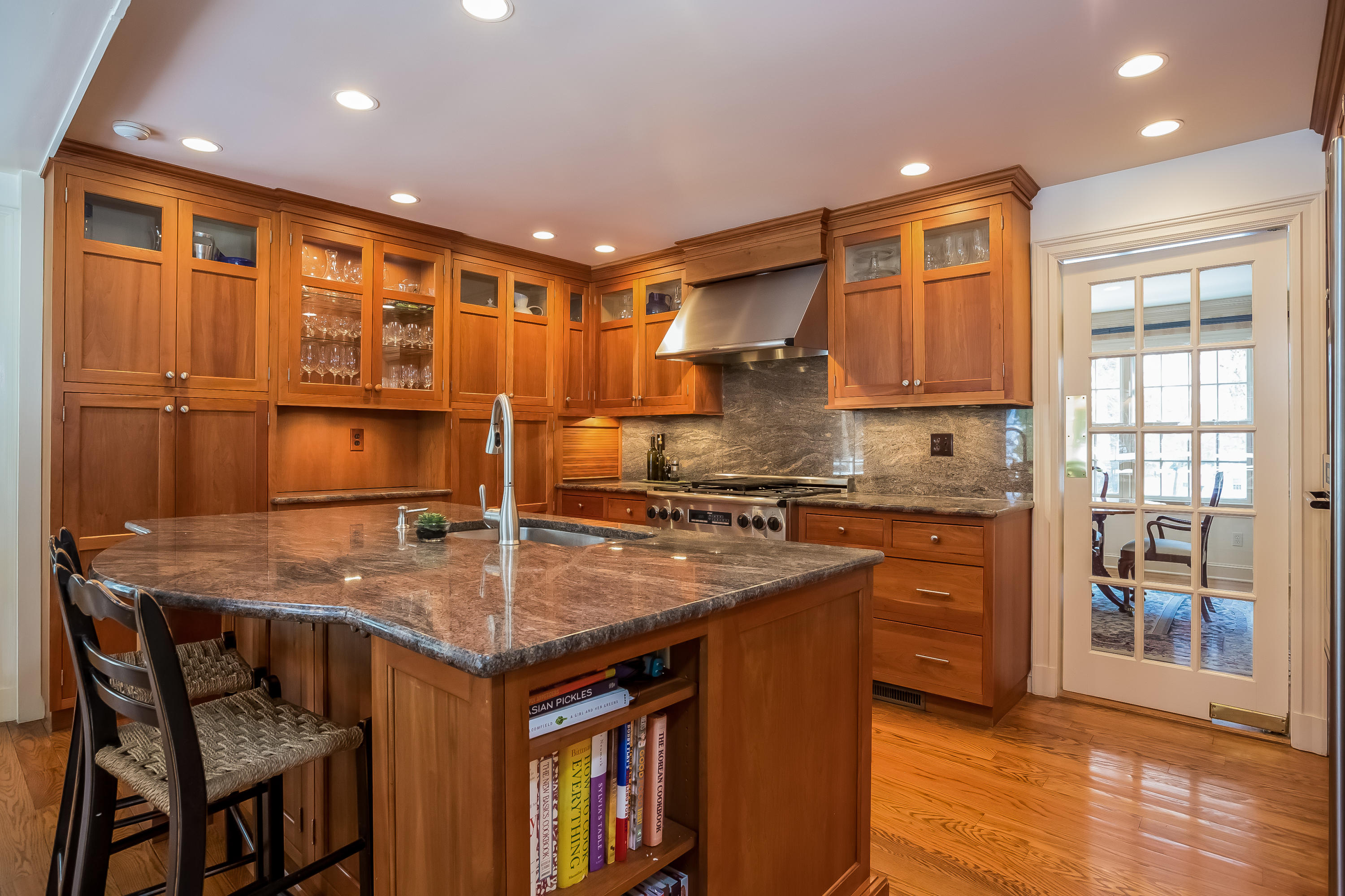 6 Watch Tower Road Darien, CT 06820 - Photo 10 of 30 a kitchen with stainless steel appliances granite countertop a kitchen island a stove a sink and a microwave
