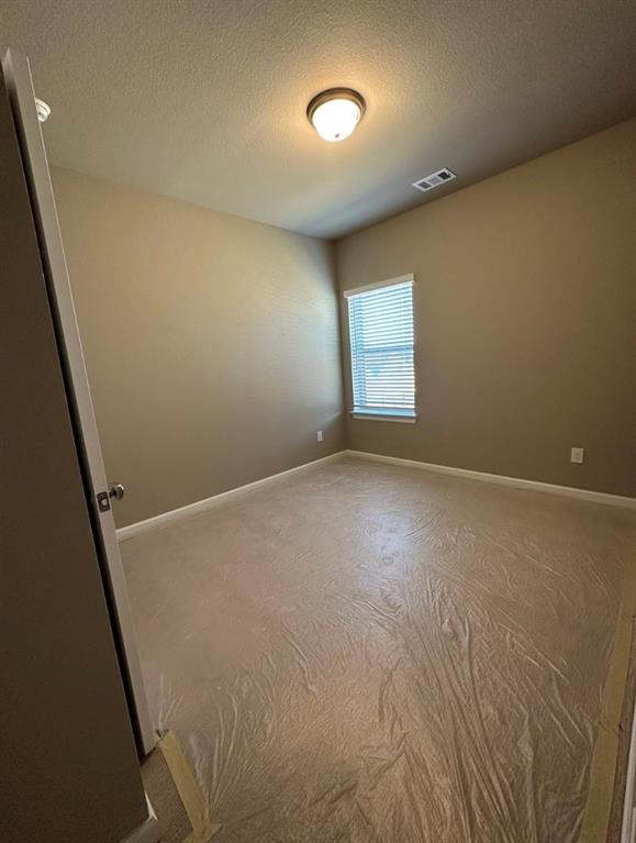 2525 Four Roses Drive Lewisville, TX 75056 - Photo 12 of 19 an empty room with windows