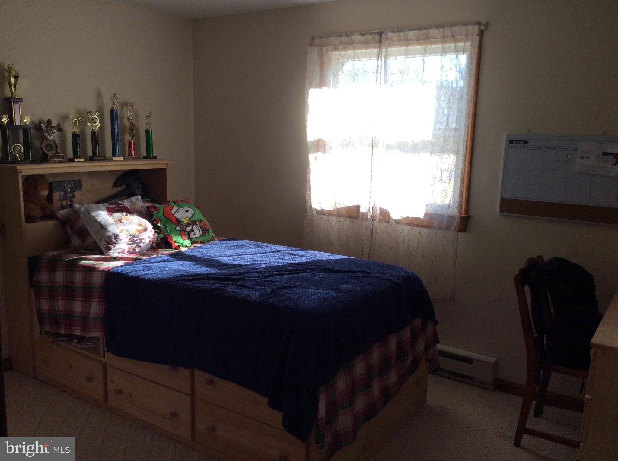 319 Red Lion Branch Road Millington, MD 21651 - Photo 22 of 31 a bedroom with a bed chair and window
