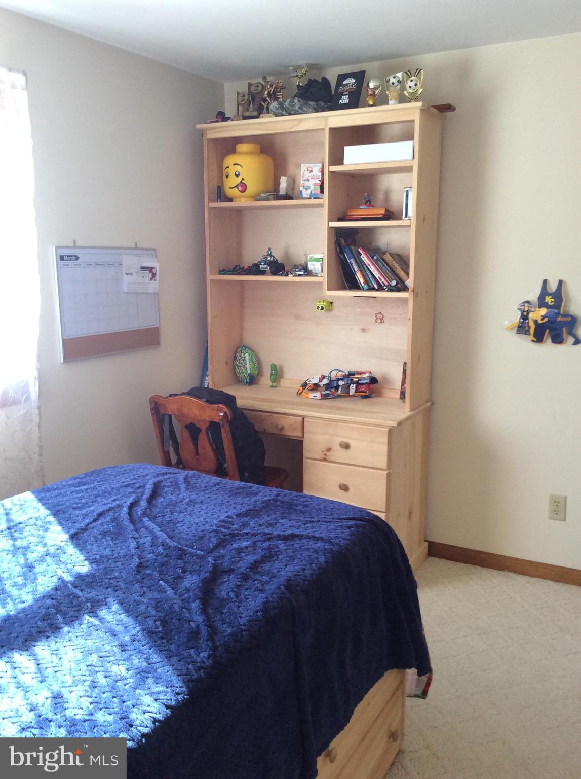 319 Red Lion Branch Road Millington, MD 21651 - Photo 23 of 31 a room with a bed and a cabinets
