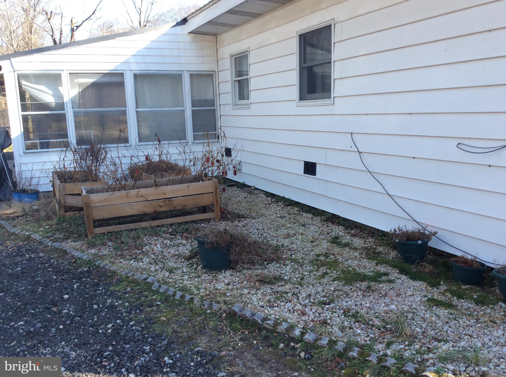 319 Red Lion Branch Road Millington, MD 21651 - Photo 29 of 31 a front view of a house with a yard