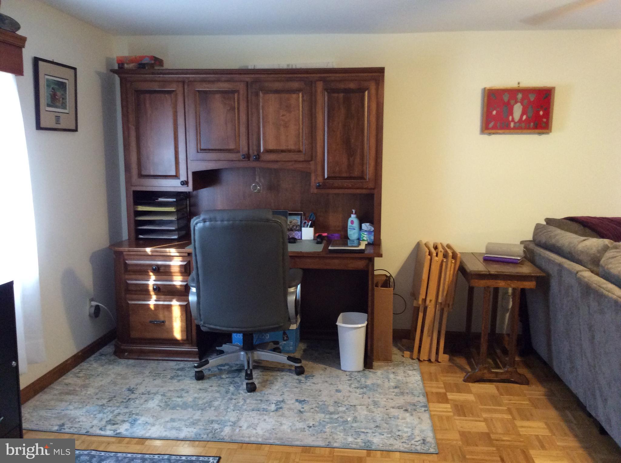 319 Red Lion Branch Road Millington, MD 21651 - Photo 5 of 31 a room with furniture a rug and white walls