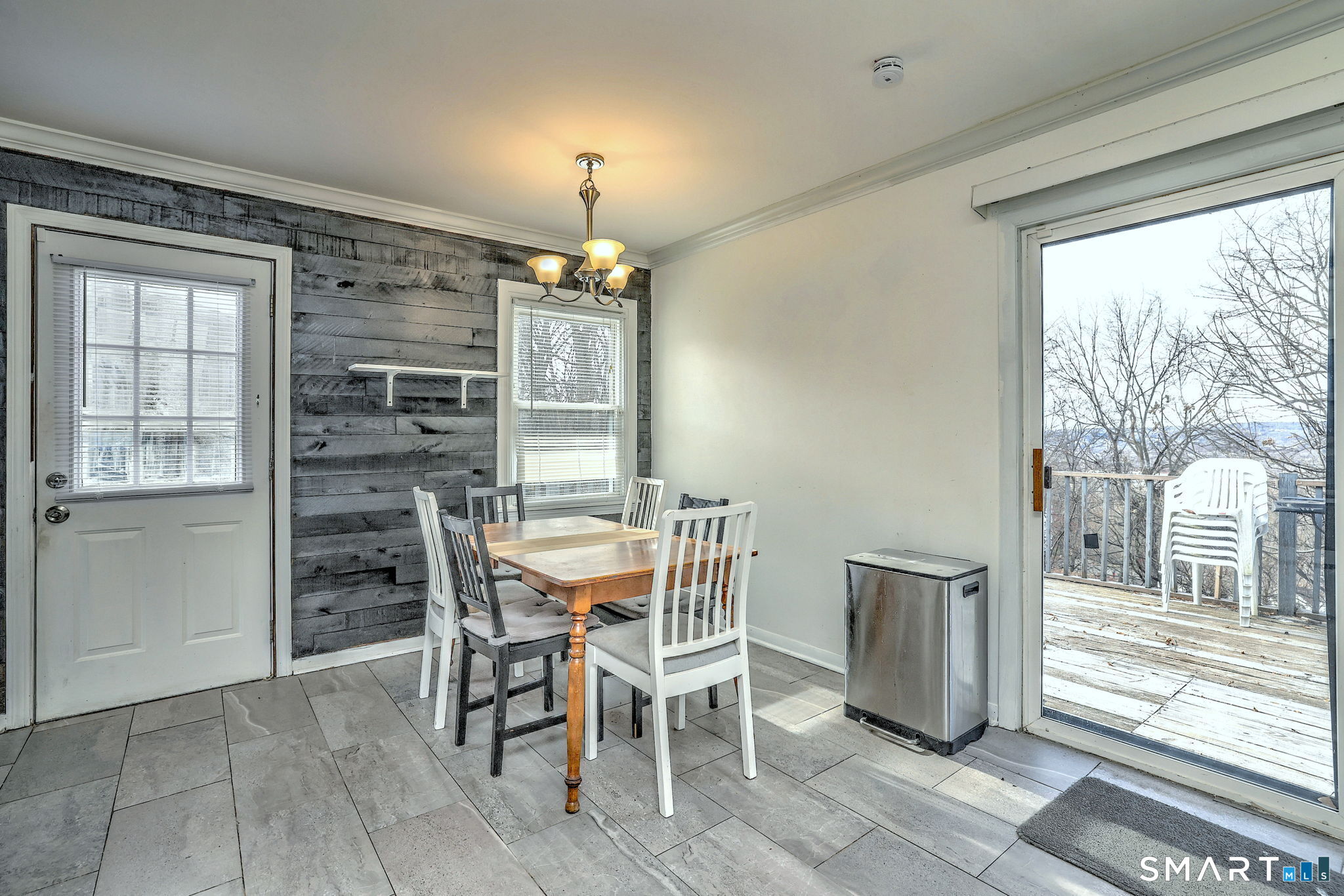42 Highland Avenue Ansonia, CT 06401 - Photo 17 of 40 a view of a dining room with furniture window and outside view