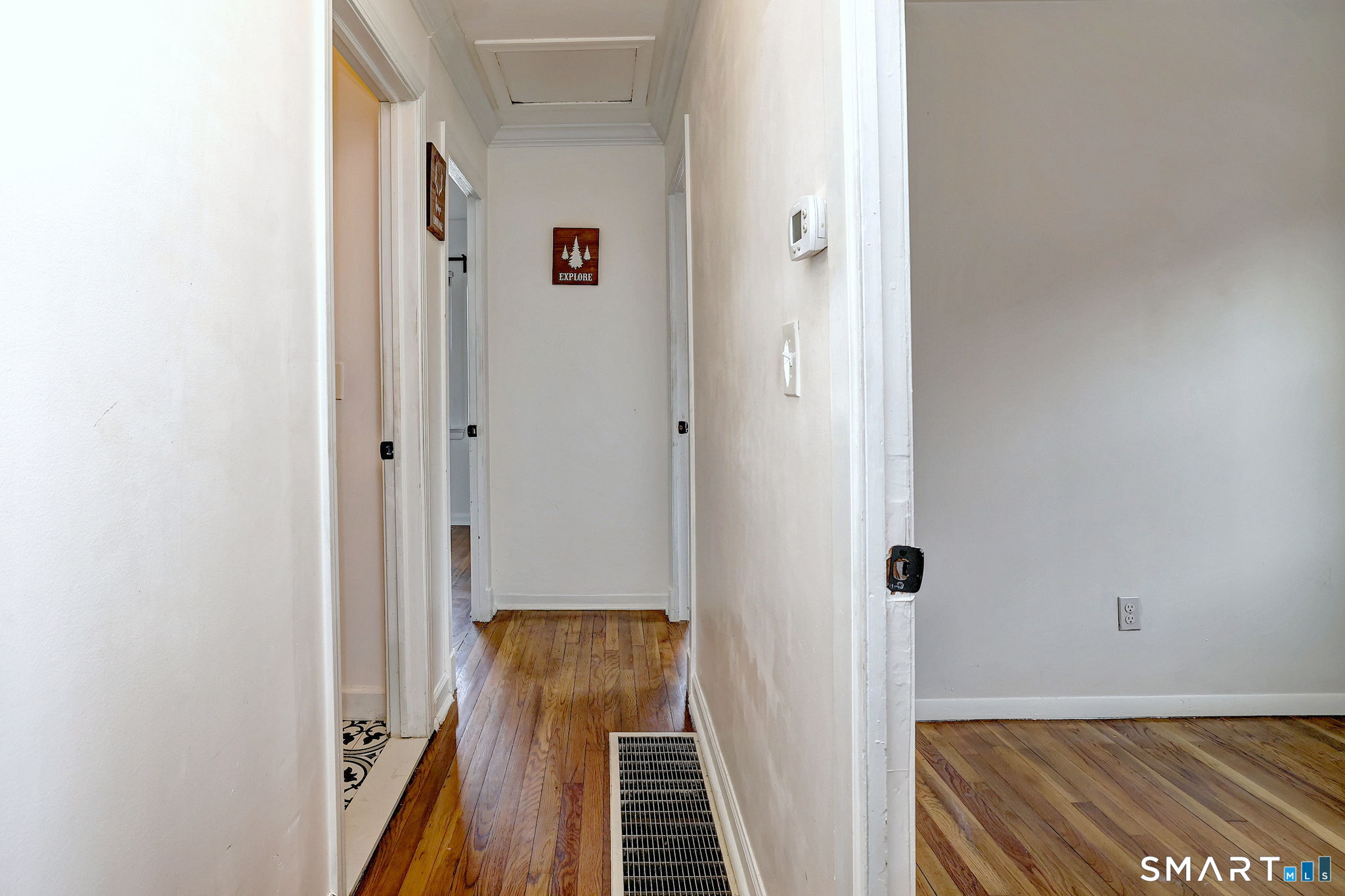 42 Highland Avenue Ansonia, CT 06401 - Photo 18 of 40 a view of a hallway with closet and wooden floor